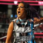 bayley-celebrates-unforgettable-night-at-wwe-evolution-event