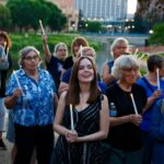 community-lights-candles-for-democracy-in-rochester-event