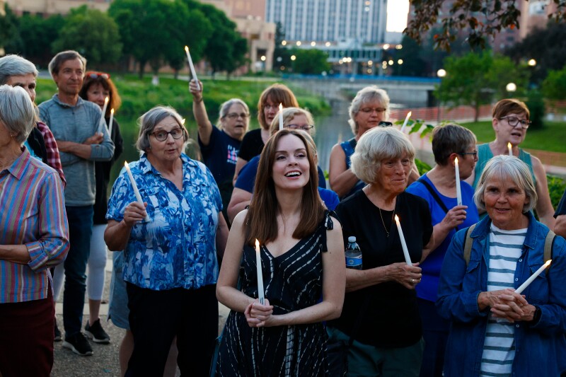 community-lights-candles-for-democracy-in-rochester-event