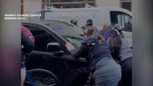 ice-vehicle-drives-through-protesters-outside-san-francisco-court