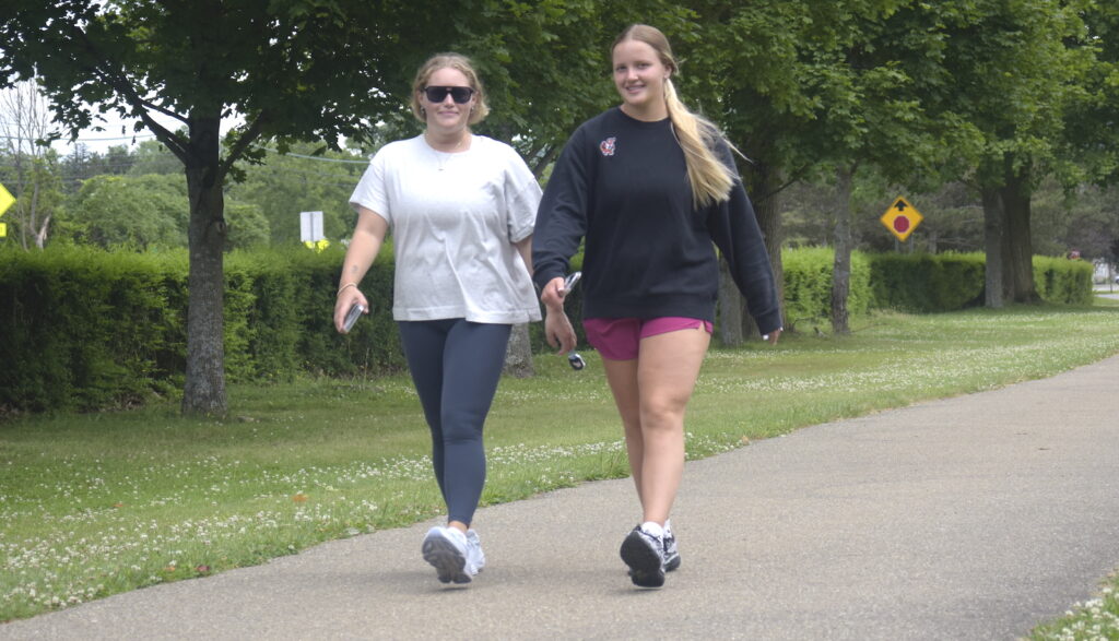 local-residents-embrace-nature-on-a-sunny-summer-walk