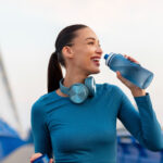 Excited,Young,Woman,Taking,Break,From,Jogging,,Having,Break,And