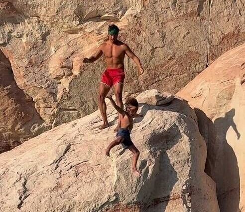 travel-influencer-sparks-outrage-after-tossing-son-off-cliff