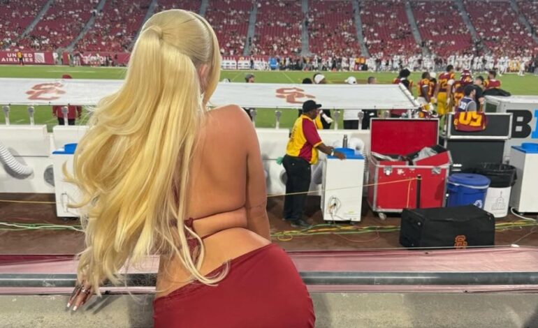 Alabama Barker Turns Heads in Daring Jersey Dress at USC Opener