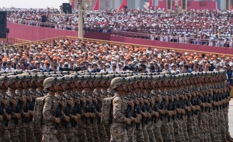 China Showcases Military Might in Massive Parade, Issues Warning