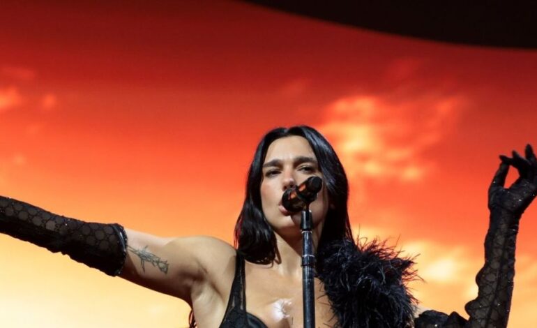 Dua Lipa Dazzles in Gold Corset at Toronto Concert Premiere