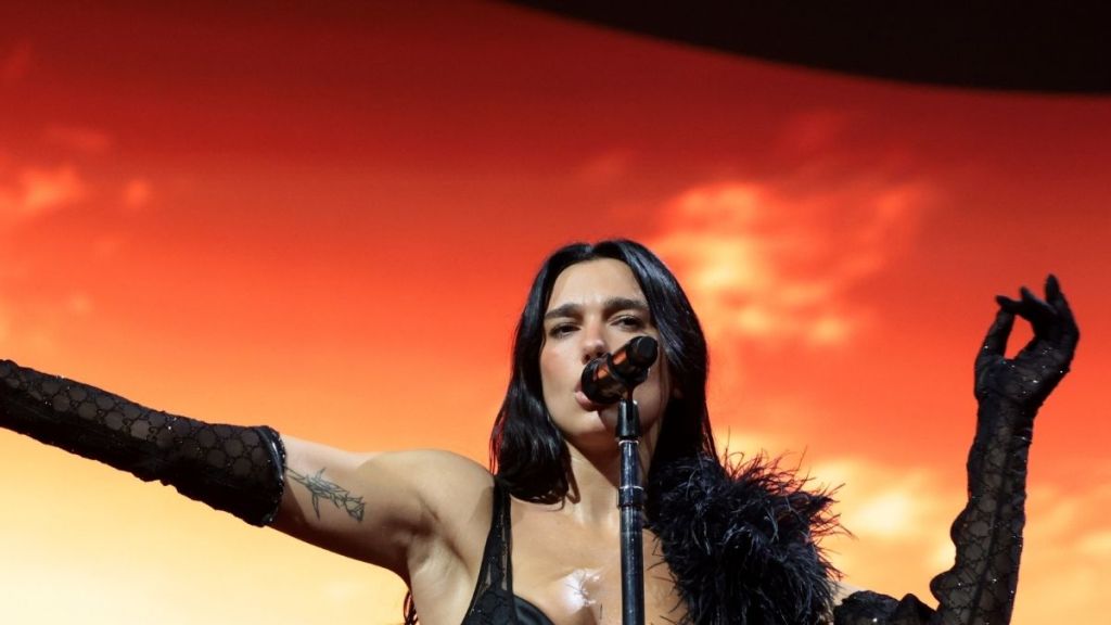 Dua Lipa Dazzles in Gold Corset at Toronto Concert Premiere