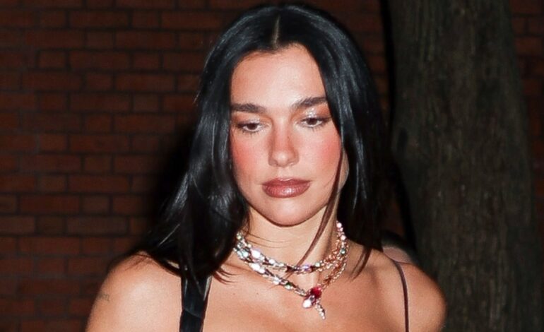 Dua Lipa Stuns in Bold Tassel Gown at NYC Fashion Event