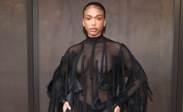 Lori Harvey Stuns in Sheer Black Dress at Milan Fashion Week
