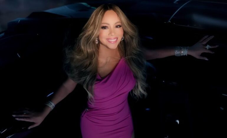 Mariah Carey Dazzles in Aqua Gown Ahead of Album Release