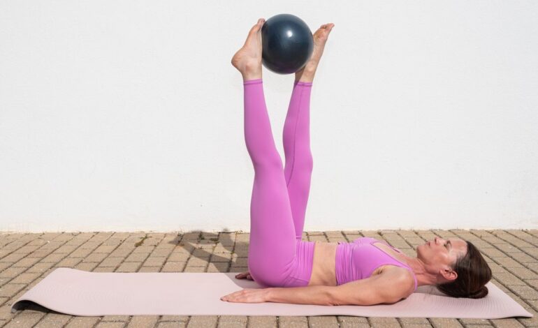 Strengthen Your Core at Home with These 5 Pilates Ball Exercises
