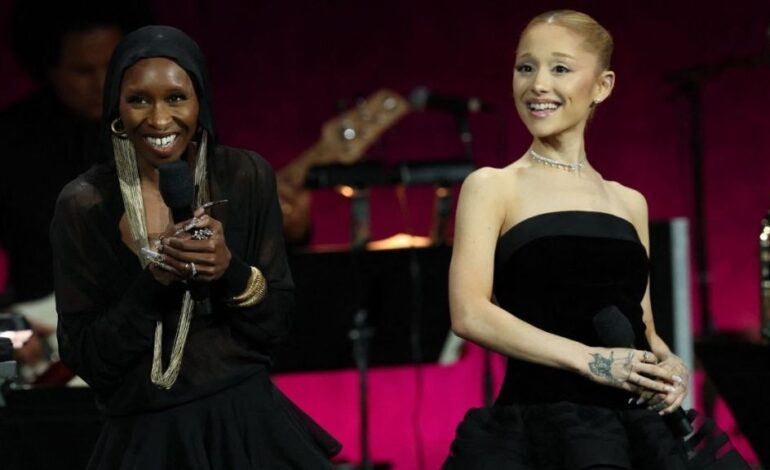 Ariana Grande & Cynthia Erivo Rush to Comfort Fan After Spill