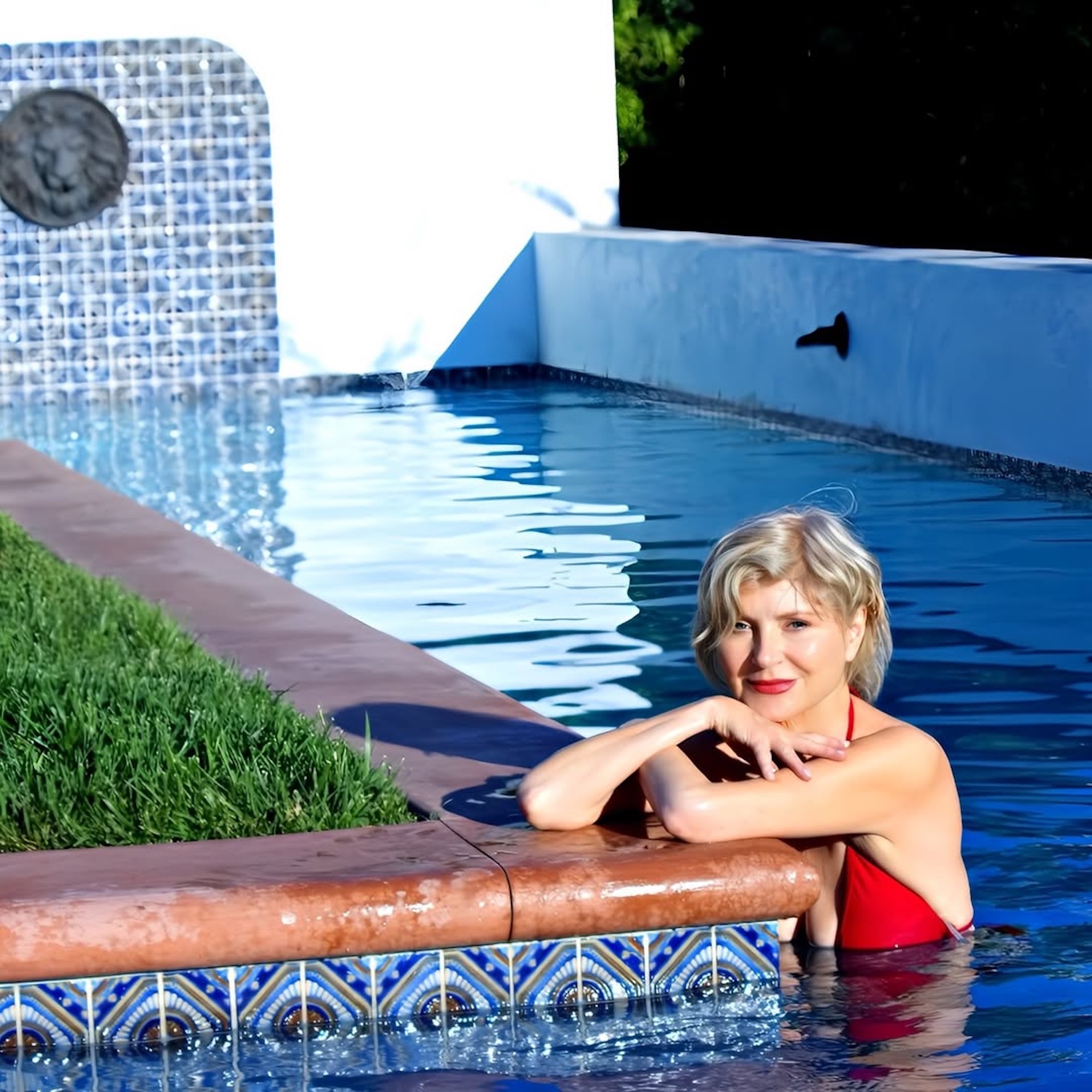 Beth Broderick Celebrates Body Positivity in Stunning Bikini