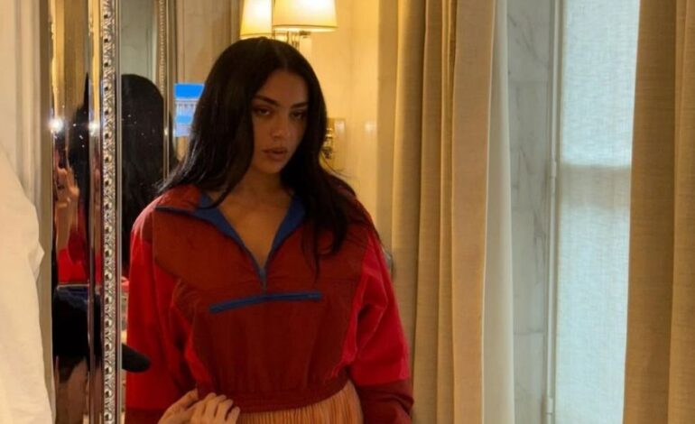 Charli XCX Turns Heads in Daring Lace Minidress at YSL Show