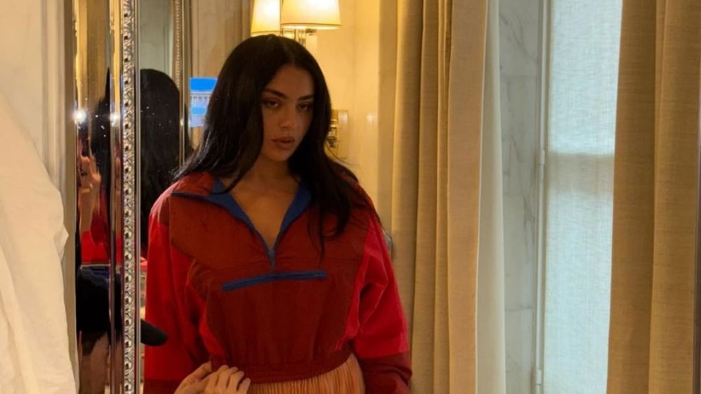 Charli XCX Turns Heads in Daring Lace Minidress at YSL Show