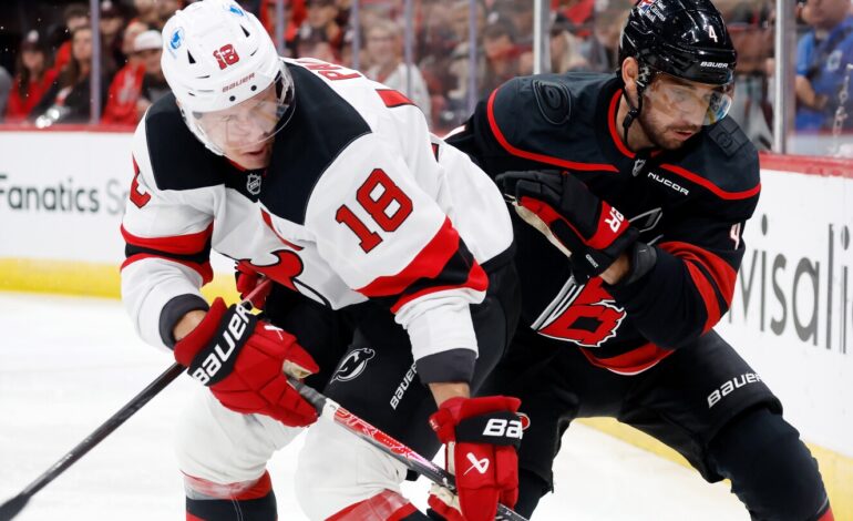 Hurricanes Surge Past Devils 6-3 in Season Opener