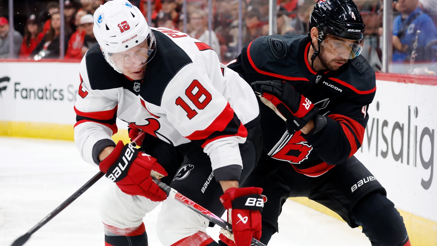 Hurricanes Surge Past Devils 6-3 in Season Opener