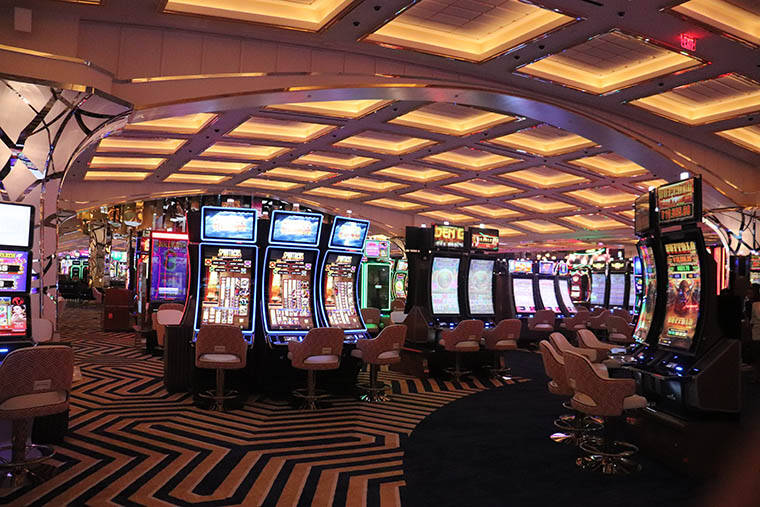 Vegas Casinos Shift Parking Fees: One Goes Free, One Charges