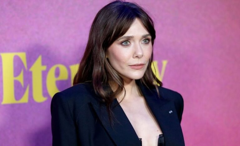 Elizabeth Olsen Wows Fans with Daring Bralette at NY Premiere