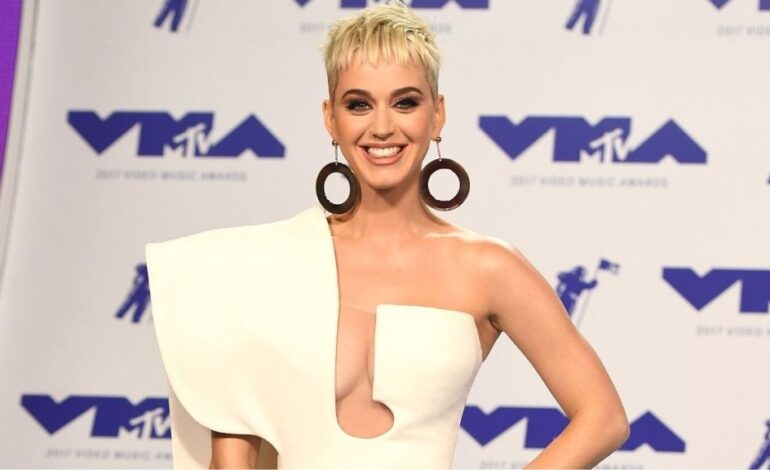 Katy Perry Dazzles in Thigh-High Slit Dress During Lyon Concert
