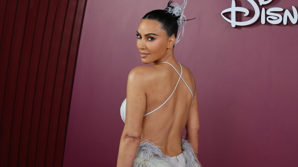 Kim Kardashian Dazzles in Backless Dress at Brazil Event
