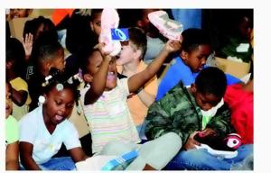 Students at Arnett Hills Receive New Sneakers to Boost Confidence