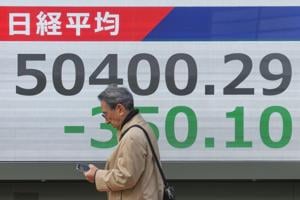 Asian Markets Dip as China Conducts Military Drills Near Taiwan