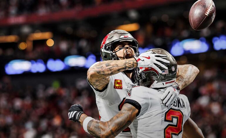 Bucs-Panthers Clash: Rookie Star Egbuka vs. McMillan in OROY Race