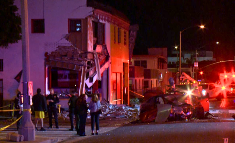 Driver Hospitalized as BMW Crashes into Santa Monica Print Shop