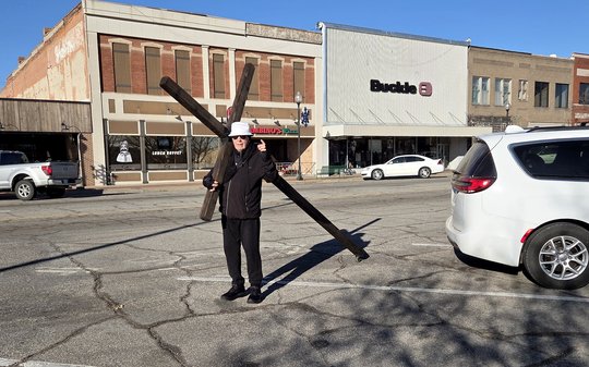 Great Bend Man Logs 5,500 Miles Carrying Cross for 10 Years