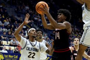 Louisville Dominates California 90-70 Behind Wooley’s 21 Points