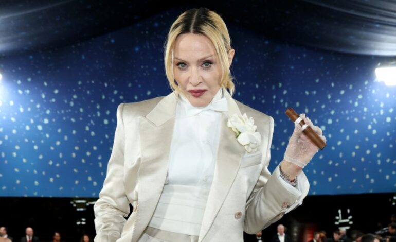 Madonna Dazzles in Bold Corset Dress, Reveals Underwear